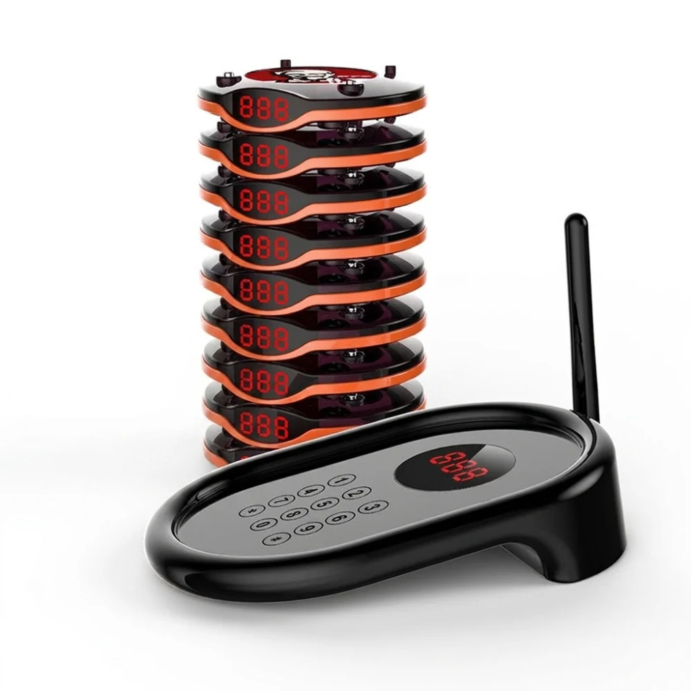 Vycall MC-S10 pagers stacked on the charging disc